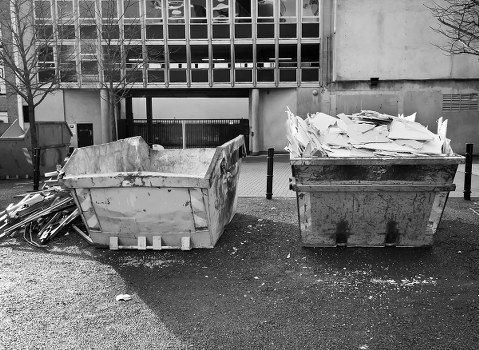 Construction site with builders waste being removed