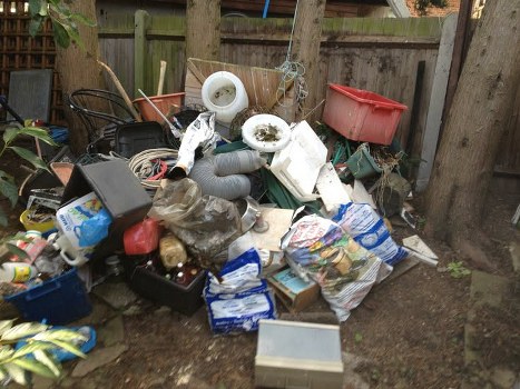 Waste management professionals assisting clients